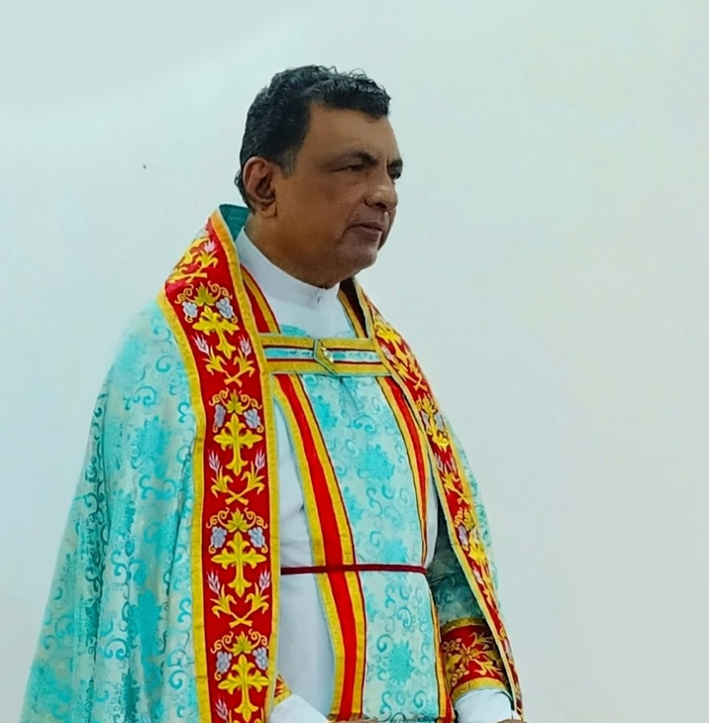 Rev. Thomas John